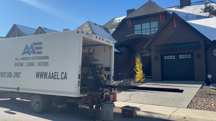 siding gutters box truck by All About Exteriors