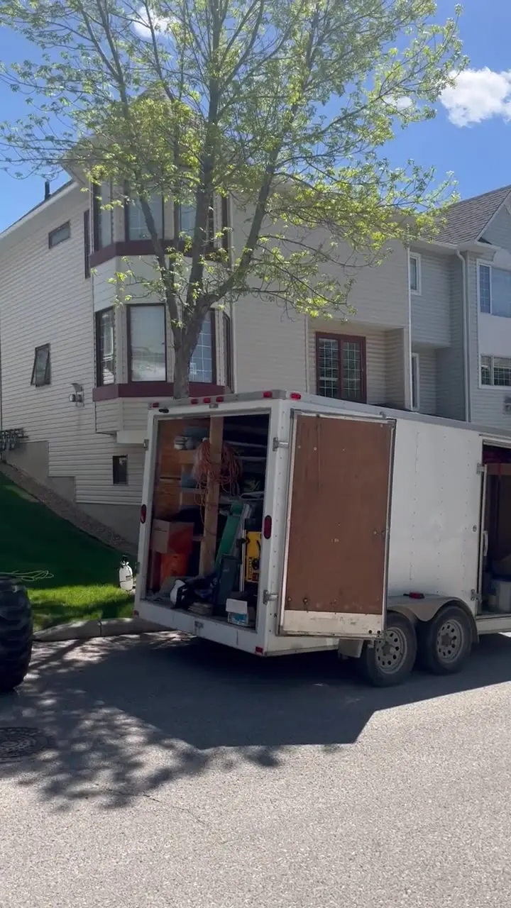 Video of an All About Exteriors crew working from a boom lift on a townhome