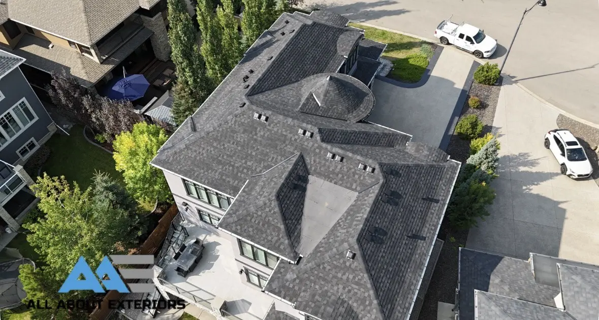 Drone photo of a finished multi hip shingle roof